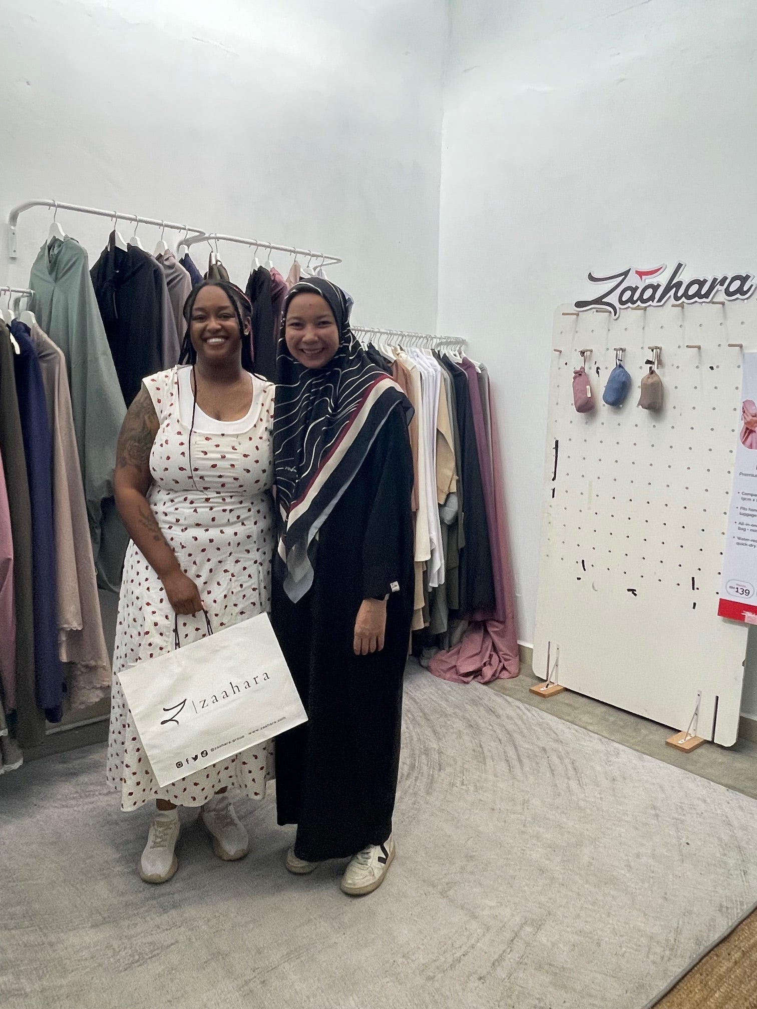 Revert Muslim traveller from the US visiting Zaahara office in Subang Jaya to purchase portable prayerwear.”