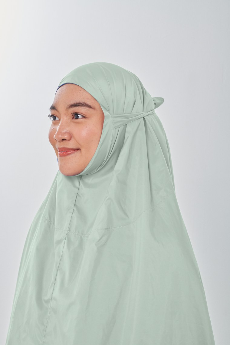 Marisa on the go travel telekung worn by Muslimah at work or airport