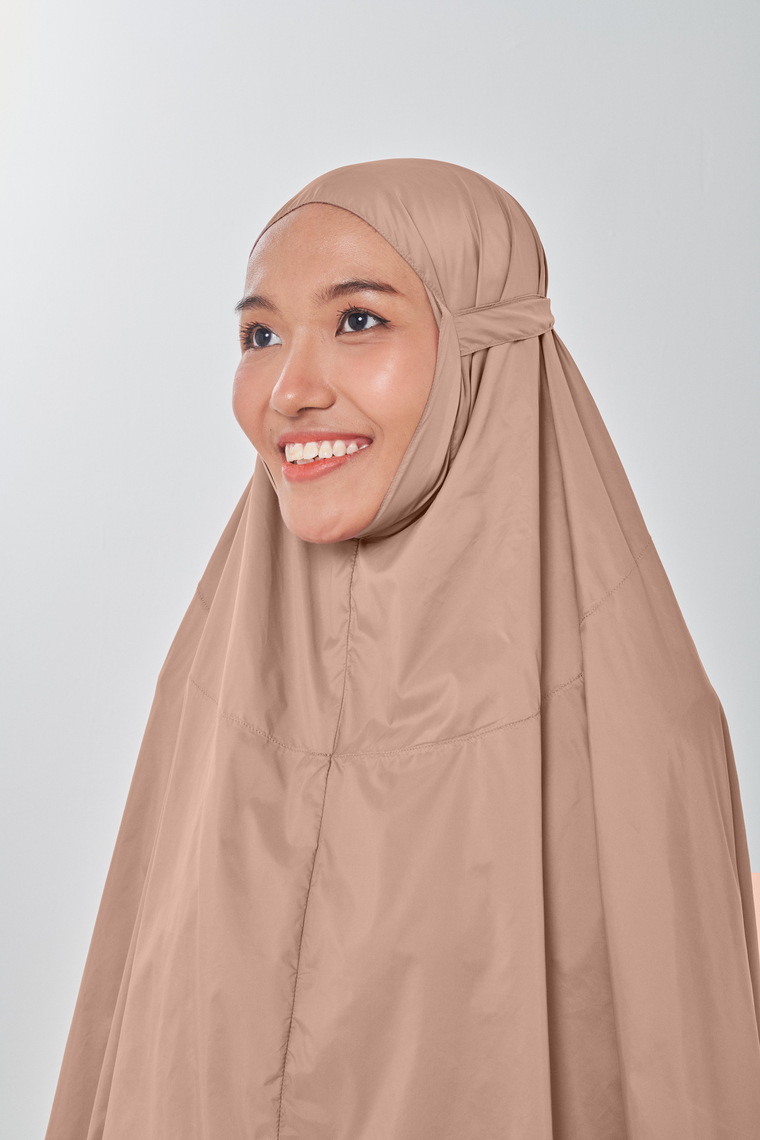 Marisa on the go travel telekung worn by Muslimah at work or airport