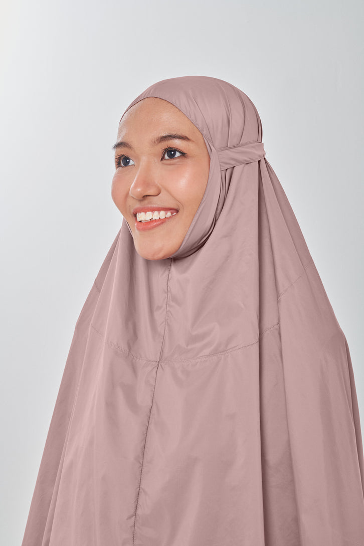 Marisa on the go travel telekung worn by Muslimah at work or airport