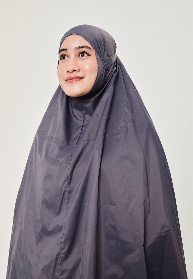 Marisa on the go travel telekung worn by Muslimah at work or airport