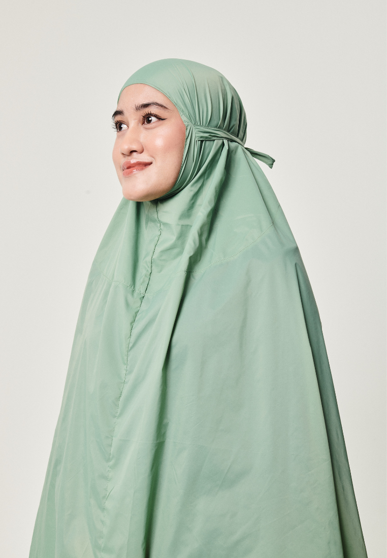 Marisa on the go travel telekung worn by Muslimah at work or airport