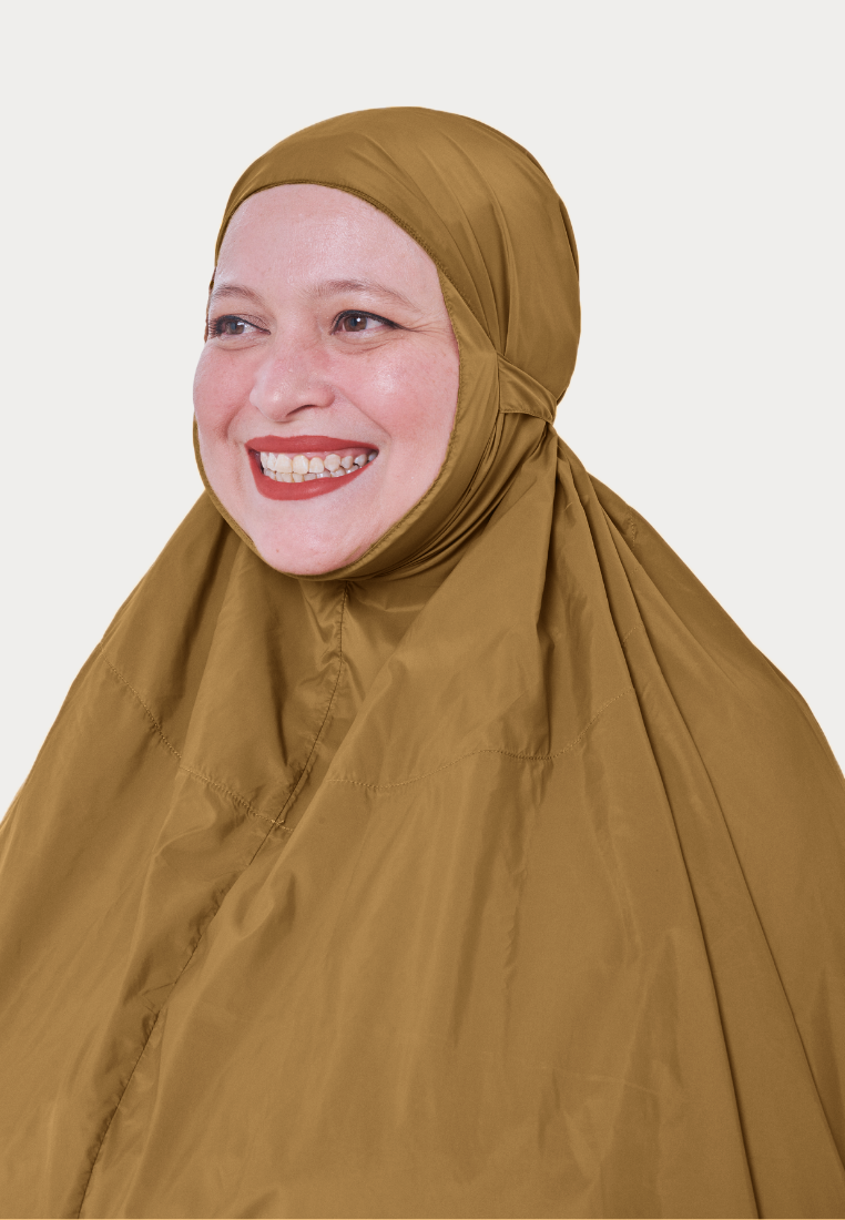 Marisa on the go travel telekung worn by Muslimah at work or airport