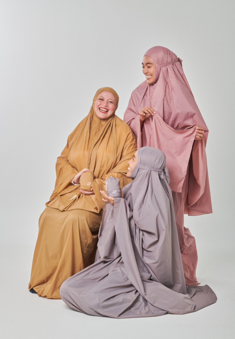 Marisa on the go travel telekung worn by Muslimah at work or airport