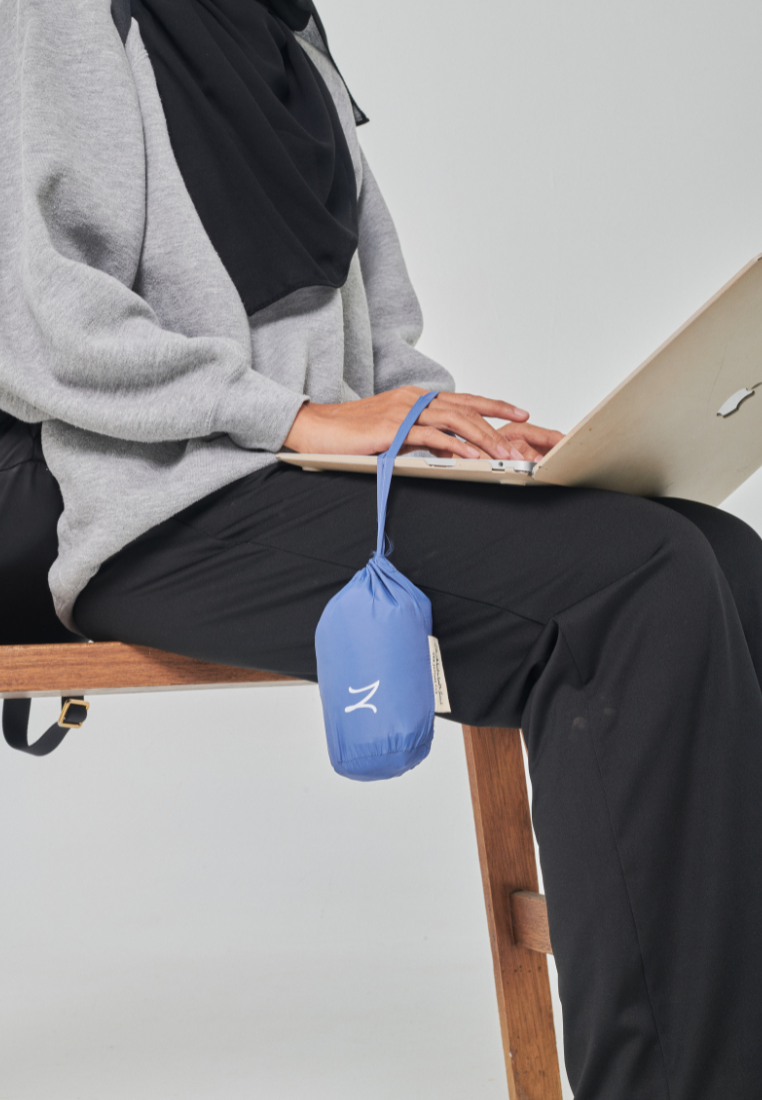 Marisa on the go travel telekung worn by Muslimah at work or airport