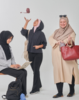 Marisa on the go travel telekung worn by Muslimah at work or airport