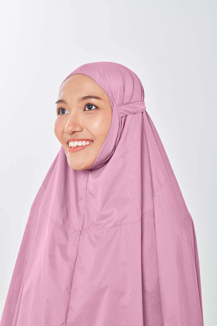Marisa on the go travel telekung worn by Muslimah at work or airport