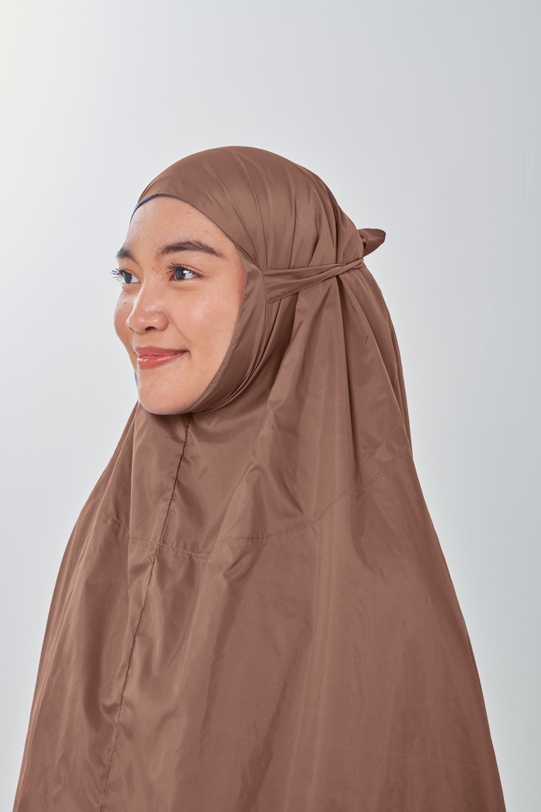 Marisa on the go travel telekung worn by Muslimah at work or airport