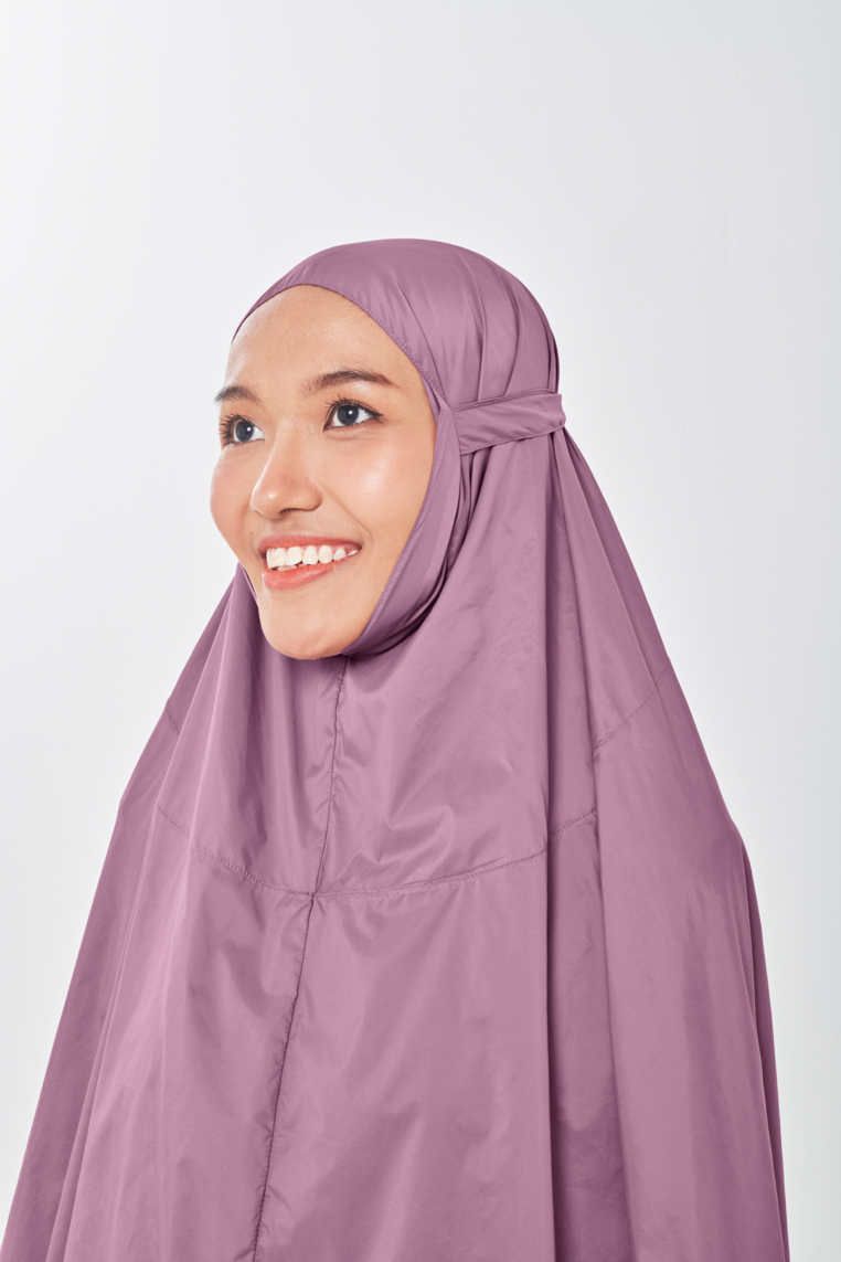 Marisa on the go travel telekung worn by Muslimah at work or airport