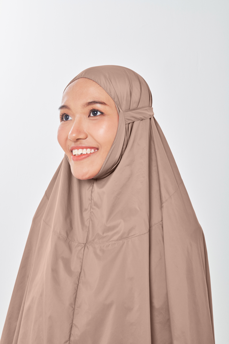 Marisa on the go travel telekung worn by Muslimah at work or airport