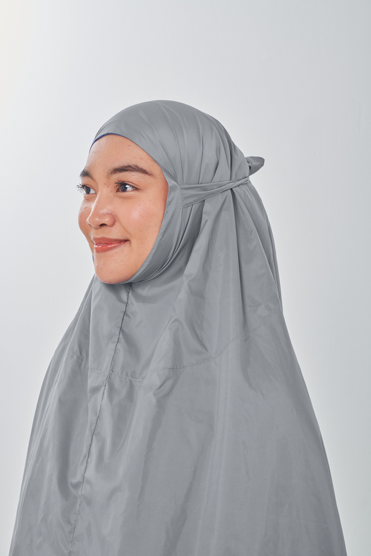Marisa on the go travel telekung worn by Muslimah at work or airport