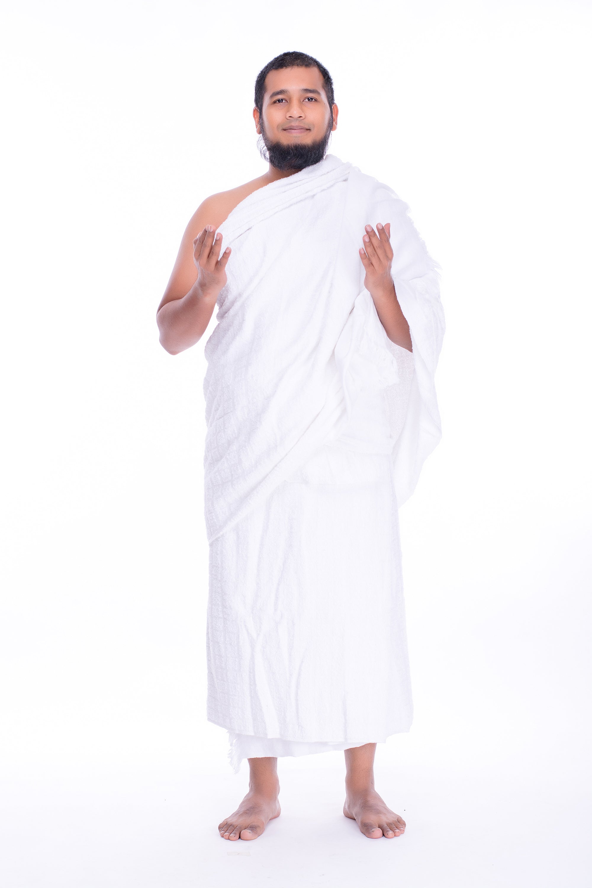 Kain ihram bahagian atas dipakai seperti selendang